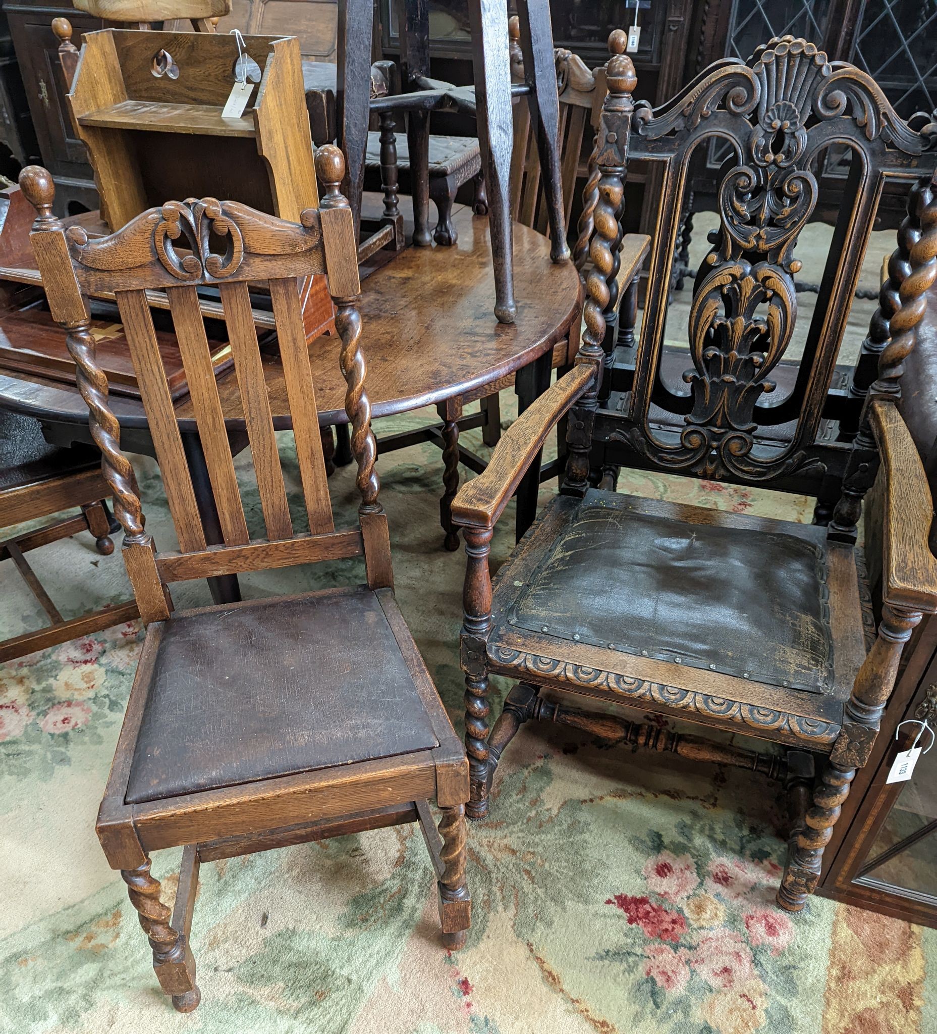 A harlequin set of six early 20th century oak dining chairs, two with arms
